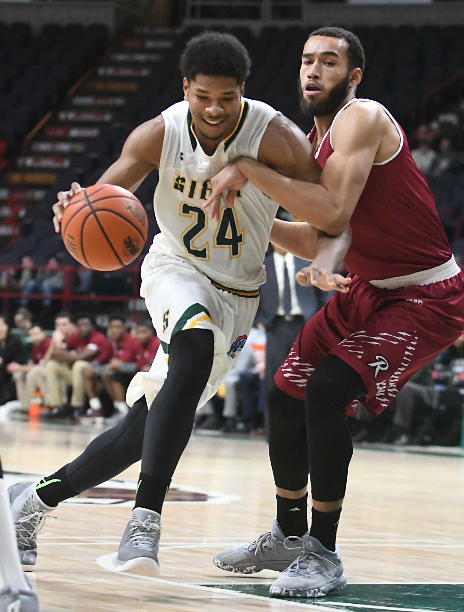 Fight, invisible handshakes during Siena basketball game