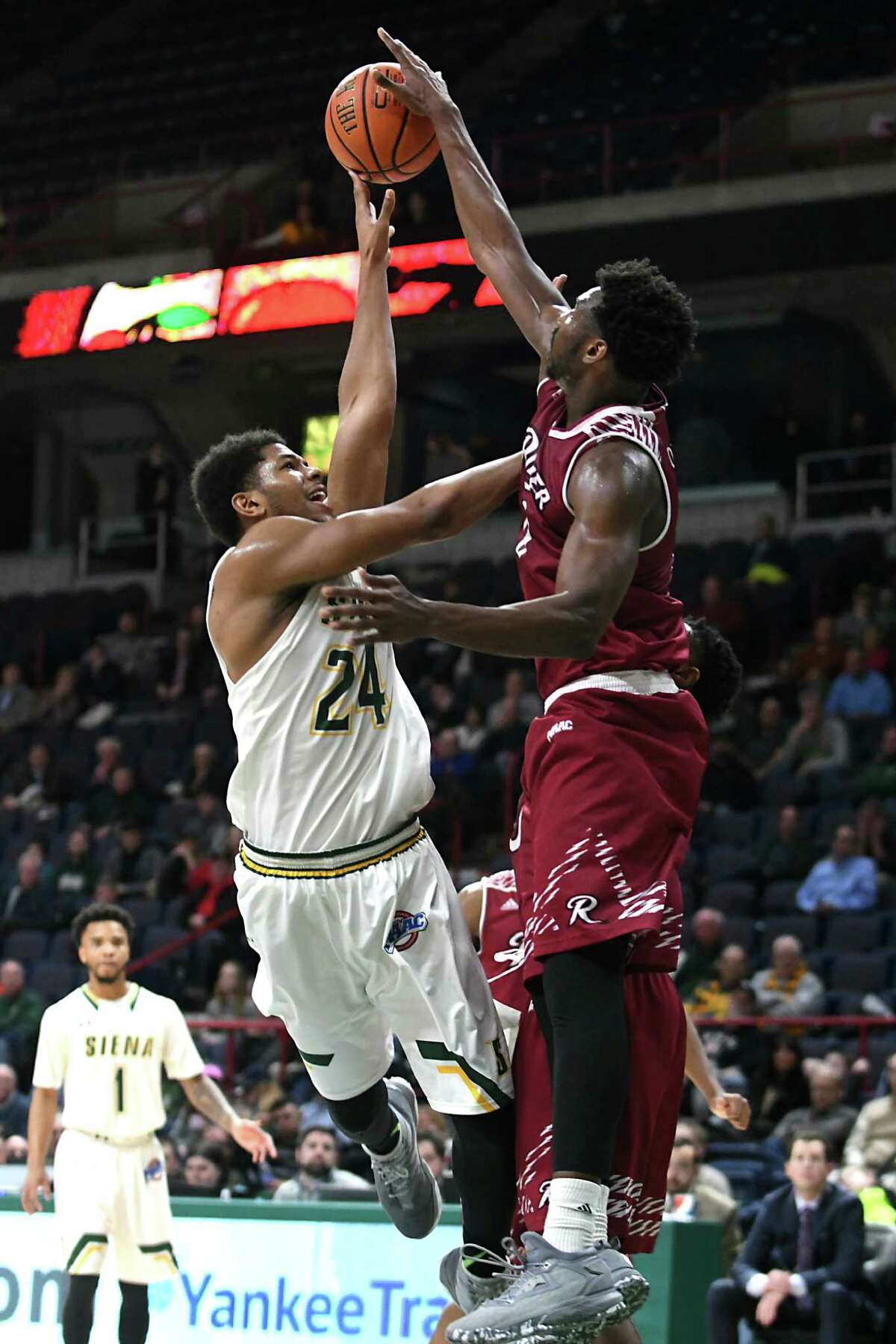 Fight, invisible handshakes during Siena basketball game