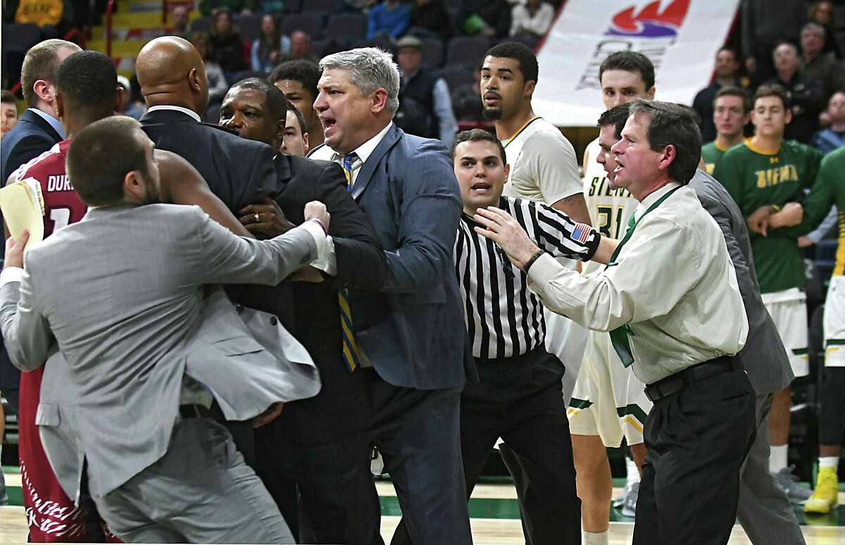 Fight, invisible handshakes during Siena basketball game