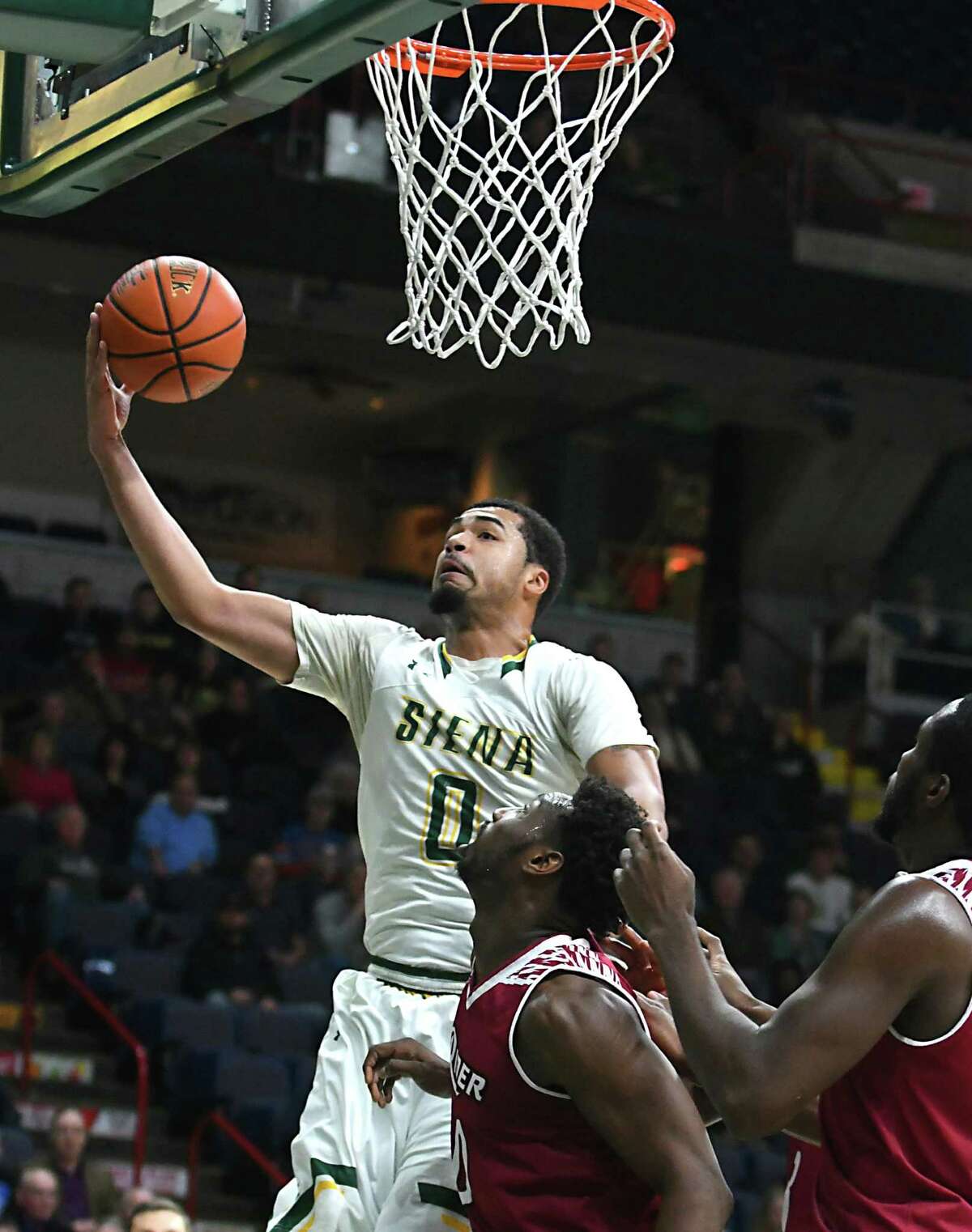 Fight, invisible handshakes during Siena basketball game