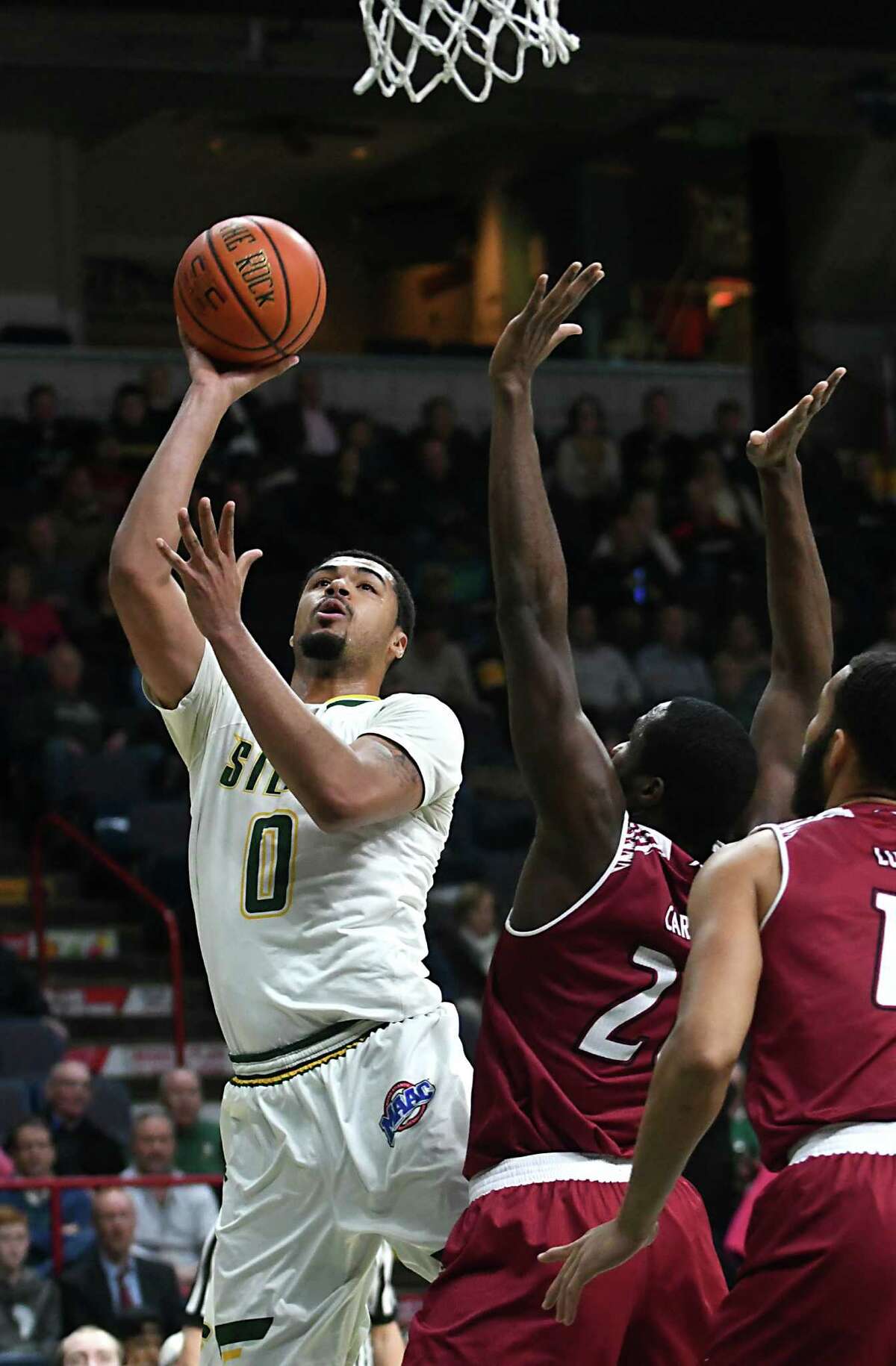 Fight, invisible handshakes during Siena basketball game