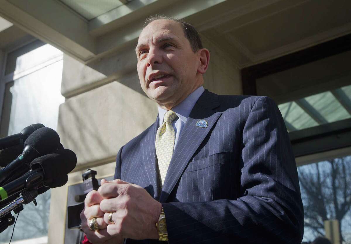 FILE - In this Feb. 24, 2015 file photo, Veteran Affairs Secretary Robert McDonald speaks to reporters outside VA Headquarters in Washington. McDonald is pushing back against claims by members of Congress that the VA has not fired enough people to turn around the scandal-plagued agency. McDonald told a Senate panel Thursday,Jan. 21, 2016, that ?“you can?’t fire your way to excellence.?” Instead, he said the VA must inspire its 340,000 workers to do better while recruiting and hiring new employees who understand the agency?’s mission. (AP Photo/Pablo Martinez Monsivais, File)
