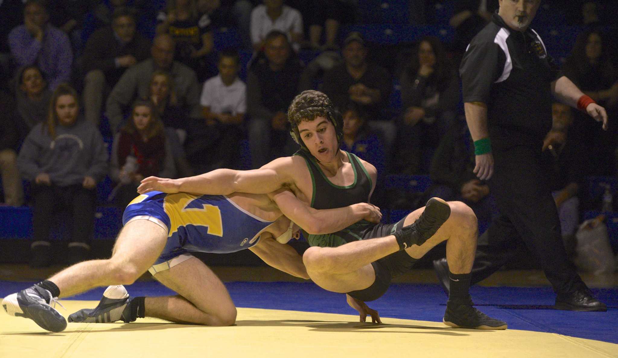 New Milford wrestling team hopes tougher schedule will be prep for