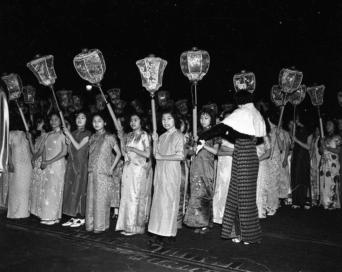 marchers with lanterns at the Chinatown Rice Bowl Party & Parade 1940