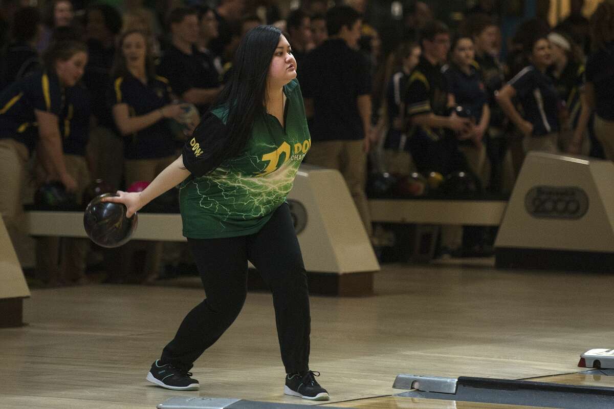 BRITTNEY LOHMILLER | blohmiller@mdn.net Dow High's Diana Mai warms up before the start of the Saginaw Valley League bowling meet Wednesday evening at Northern Lanes.