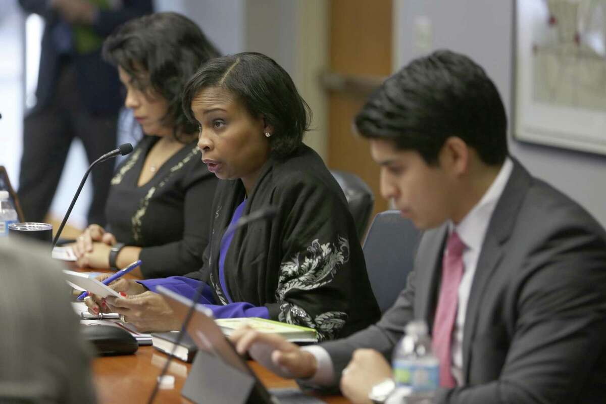 Mayor Ivy Taylor, center, asks a question of Mike Frisbie after he briefed city council Wednesday, Jan. 18, 2017 on the status of fiber installations around the city during a city council B Session. Google Fiber has stopped construction of its network while AT&T has over 100 crews working on its network. Google has recently been under criticism for the size and location of its so-called huts that serve as a hub for a specific area of the city.