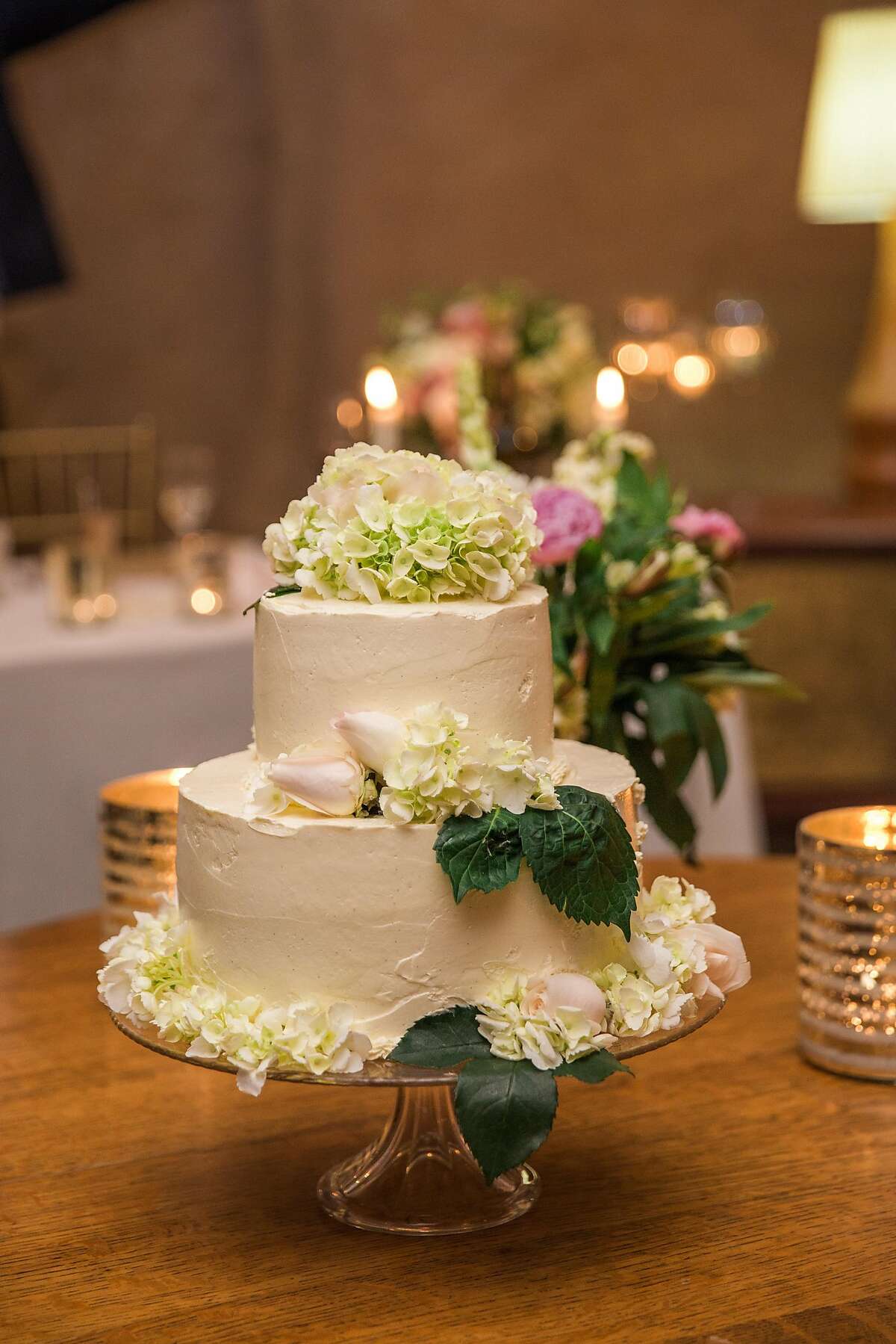 For their June 26 Napa wedding, they easily agreed on the private venue. Trish�s mother helped make traditional dishes from their Burmese heritage using family recipes for the post-ceremony dinner. Adam�s mother, known for her baking prowess, made the tiered cake; his father officiated.