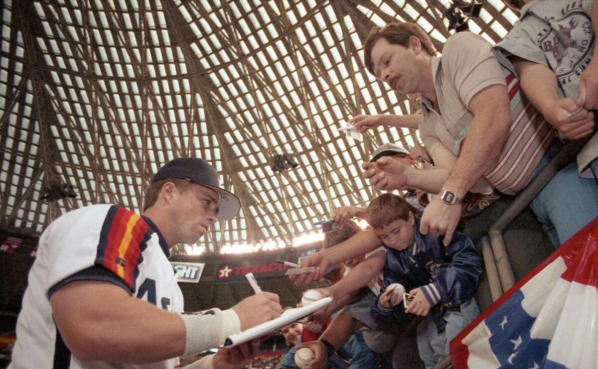 These fans at the Astrodome were among many who have received an autograph from Jeff Bagwell, who now can add the inscription "HOF '17" to his signature.