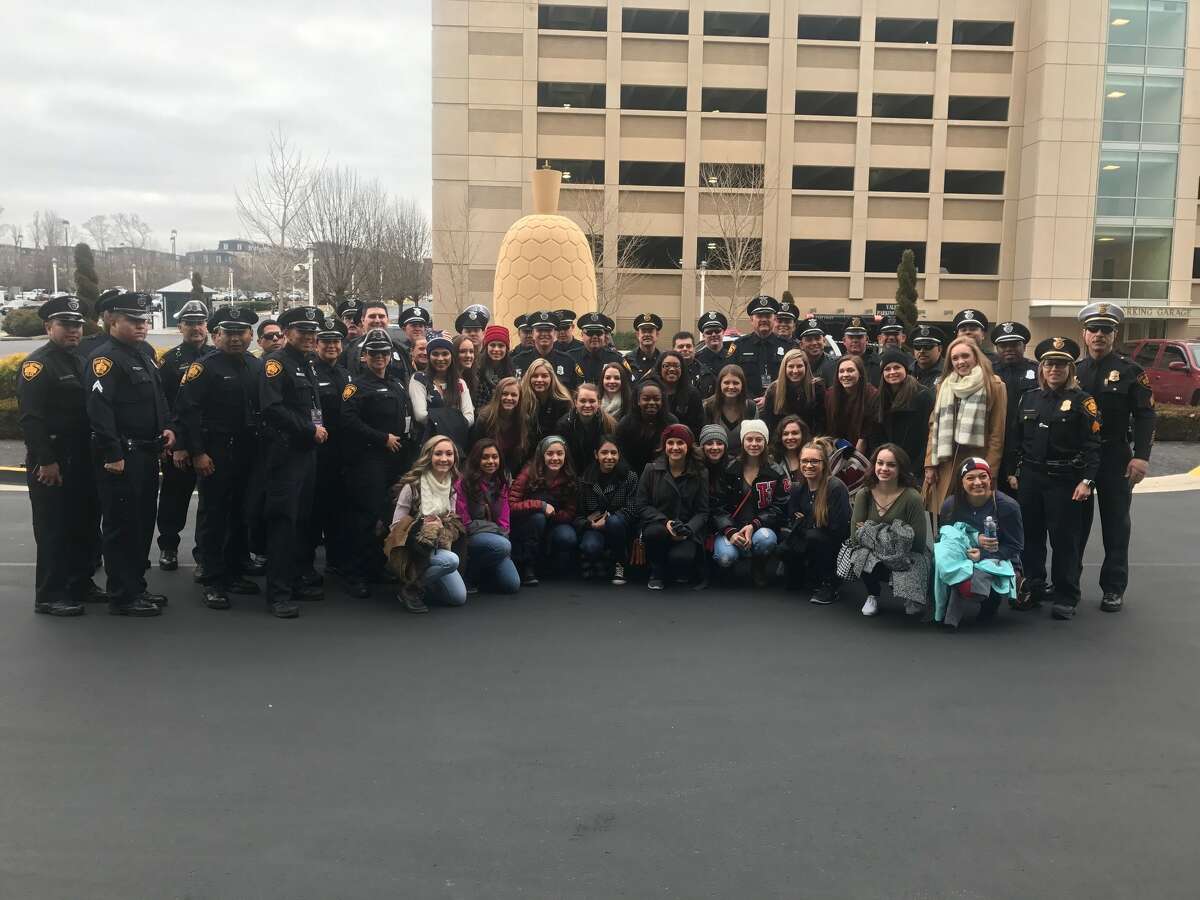 San Antonio police officers pose with TDEA dance students in Washington D.C. The San Antonio Police Department sent 45 officers to Washington D.C. Wednesday morning to help with security during Inauguration Day. The dancers will perform at the Texas Society Boots and Black-Tie Gala on Wednesday, Jan. 19, 2017.