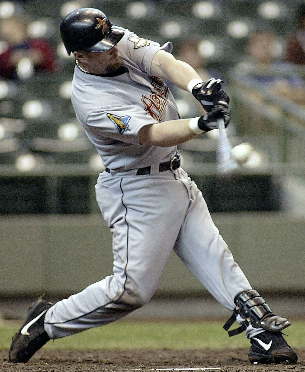 Houston Astros’ Jeff Bagwell hits a home run against the Milwaukee Brewers in the fifth inning on April 20, 2003, in Milwaukee.