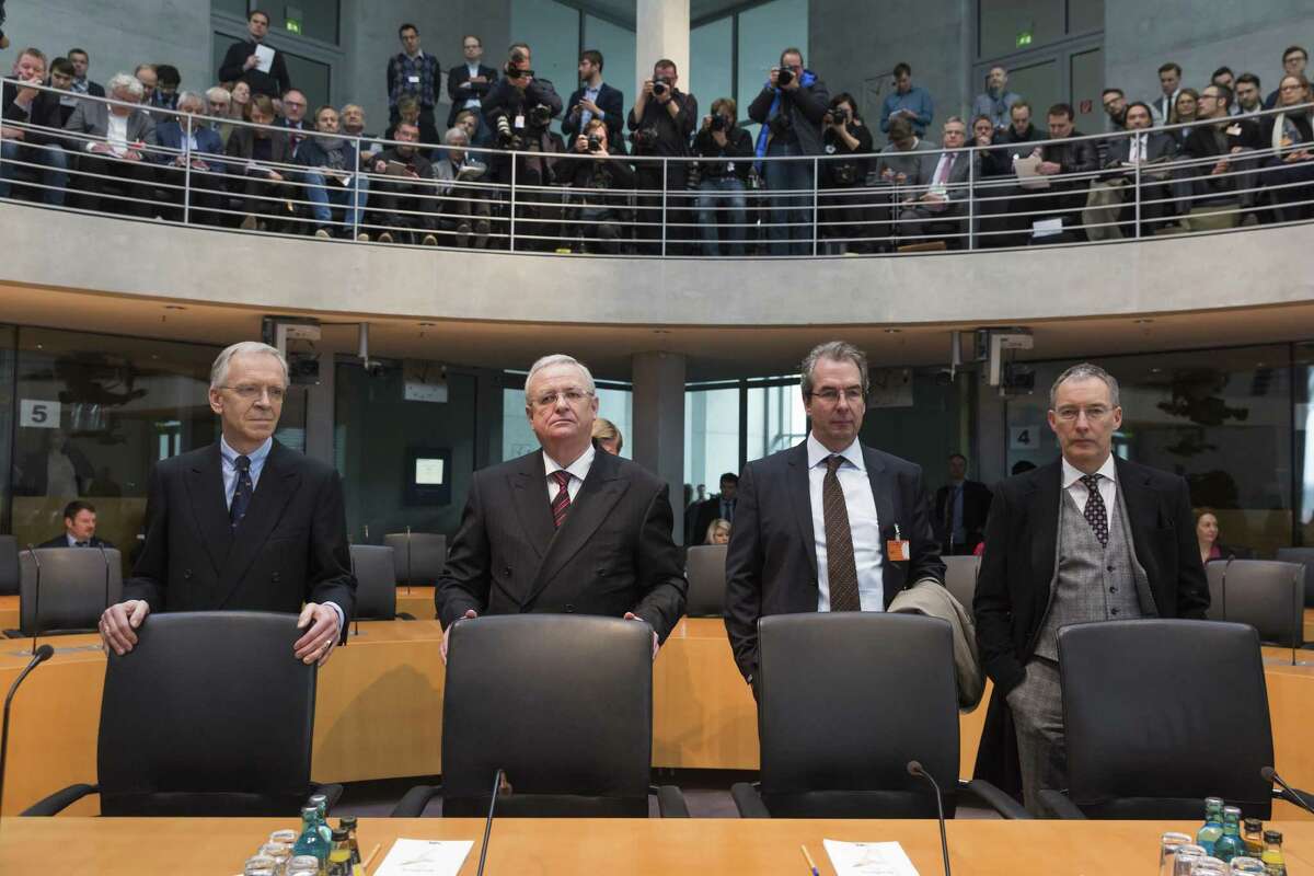 German members of parliament have been looking into what the government knew about emissions manipulation by carmakers and whether regulators took actions to prevent the cheating. Appearing before the panel Thursday were: lawyer Kersten von Schenck (from left); former Volkswagen CEO Martin Winterkorn; Gerwin Postel, in-house lawyer at Volkswagen; and lawyer Robert Unger. Winterkorn apologized for breaching the trust of millions of customers while defending his tenure.
