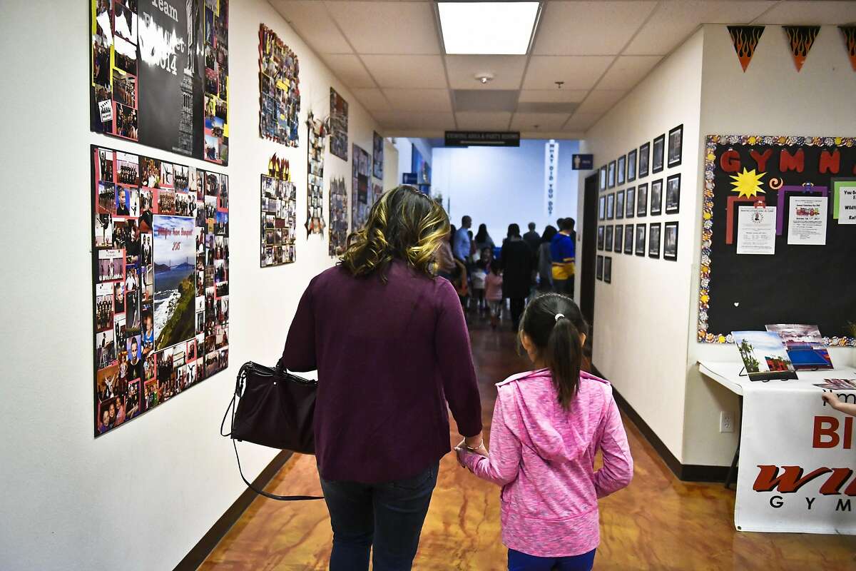 Tallia Hart left, and her daughter Lola Bodenhamer, 9, right, before Lola's gymnastics practice Wednesday evening. Newly elected San Francisco Chamber of Commerce President Tallia Hart and her daughter Lola Bodenhamer, 9, at their home and gymnastics practice on Wednesday, Jan. 18, 2017 in Trabuco Canyon, Calif.