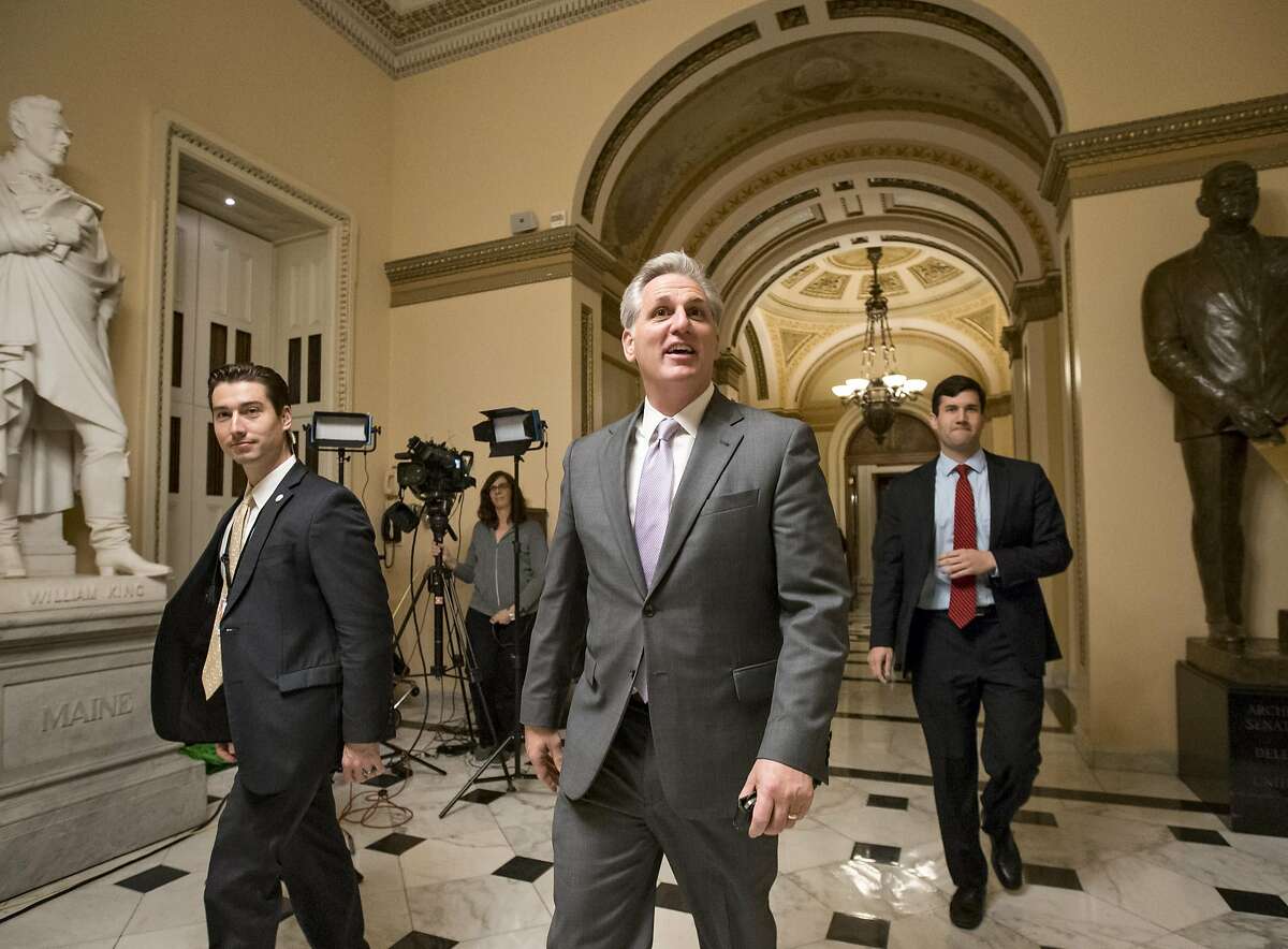House Majority Leader Kevin McCarthy, R-Calif., smiles as he departs the chamber just after the GOP-controlled House of Representatives voted to eliminate key parts of President Barack Obama's health care law and to stop taxpayer funds from going to Planned Parenthood, at the Capitol in Washington, Wednesday, Jan. 6, 2016. It is the 62nd vote House Republicans have cast to repeal or diminish the Affordable Care Act, but this is the first time their bill will end up on the president's desk. President Obama has said he will veto the legislation. (AP Photo/J. Scott Applewhite)