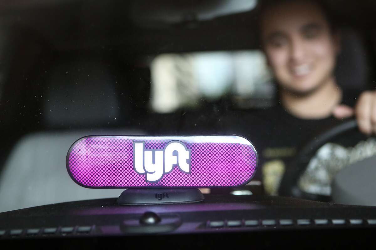 Lyft driver Marvin Lopez with the new "AMP" device in San Francisco, Calif., on January 19, 2017.