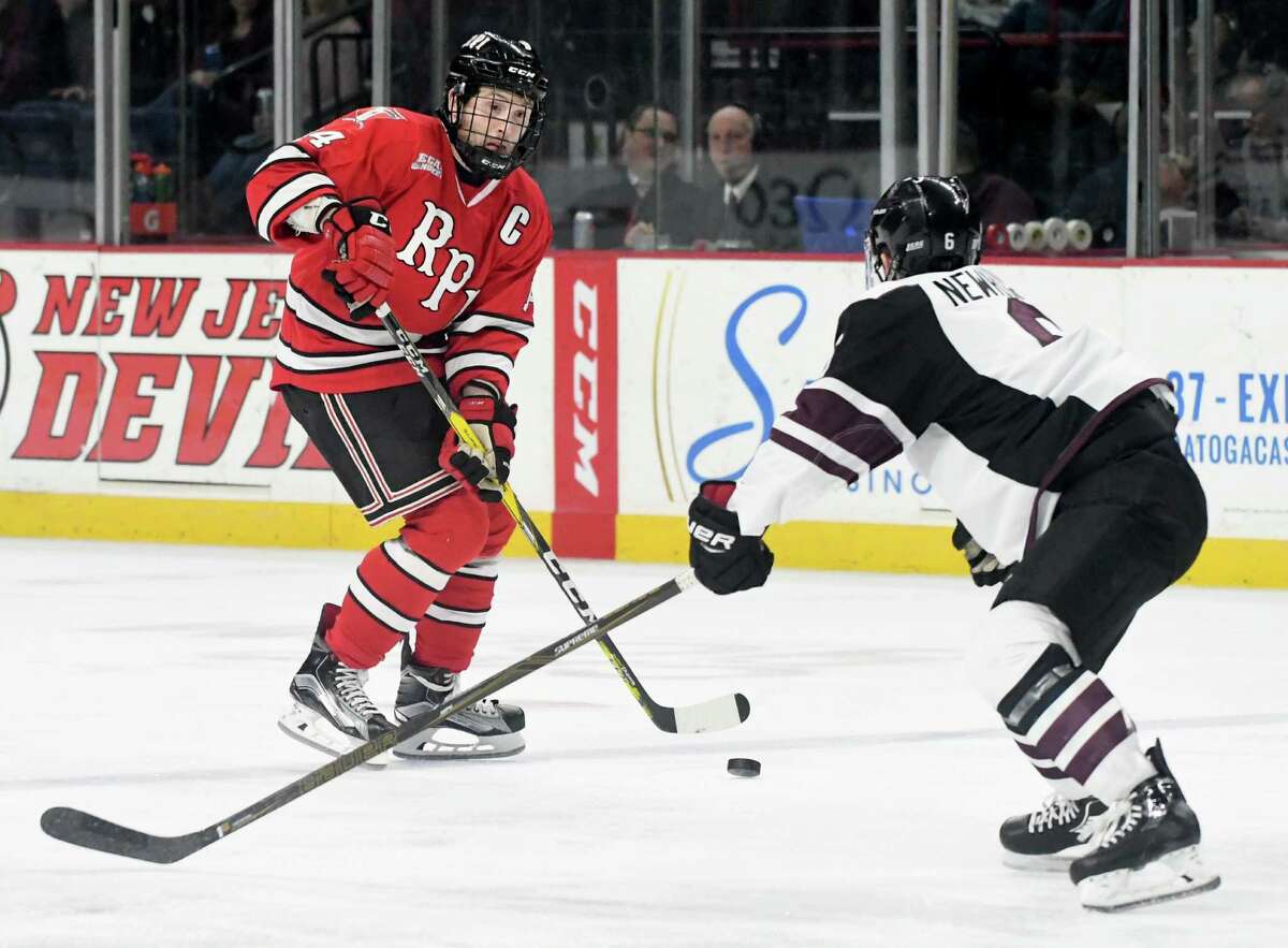 RPI's Riley Bourbonnais is defended by Union's Ben Newhouse during the Mayor's cup hockey game at the Times Union Center on Thursday, Jan. 19, 2017 in Albany, N.Y. (Lori Van Buren / Times Union)
