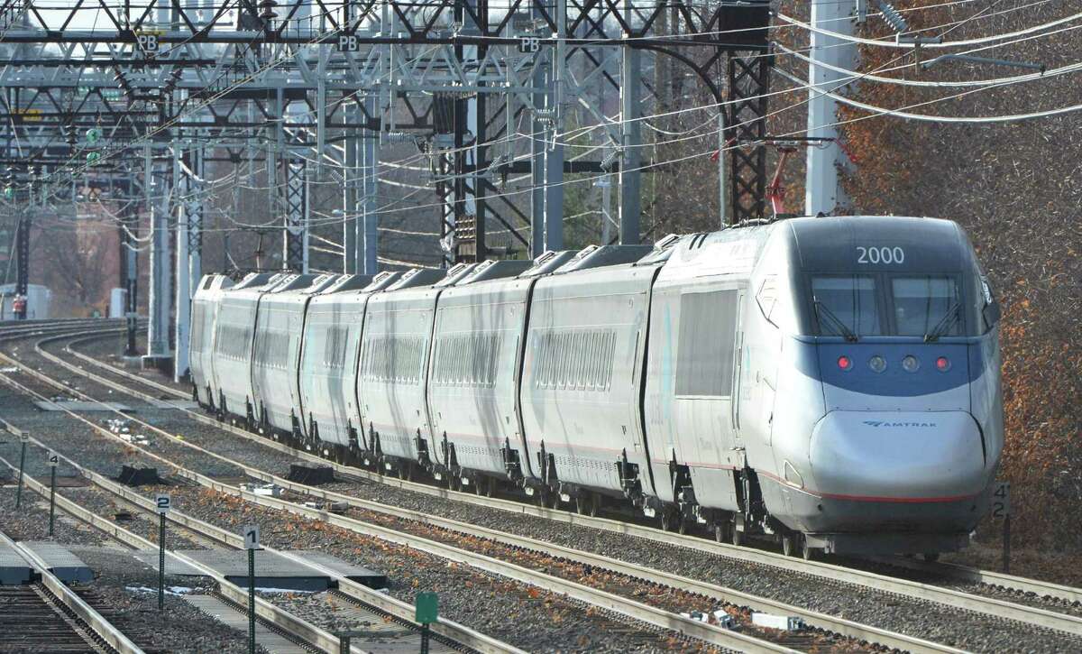 Amtrak's Acela Express passes through Norwalk westbound on Monday December 19, 2016 in Norwalk Conn. Amtrak wants to re-route its tracks between Greenwich and Greens farms to make high speed rail travel possible