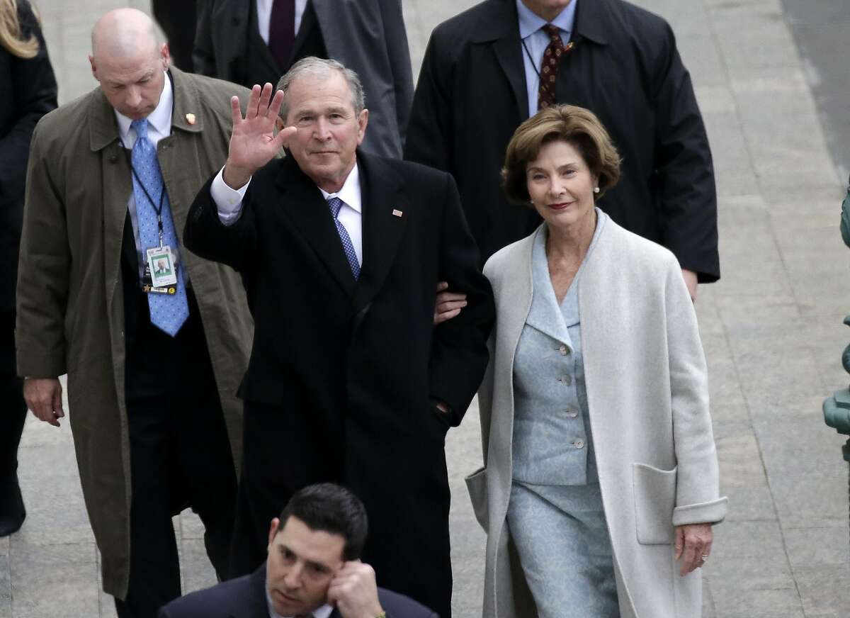 Former U.S. President of the United States George W. Bush and wife Laura Bush arrive near the east front steps of the Capitol Building before President-elect Donald Trump is sworn in at the 58th Presidential Inauguration on Capitol Hill on January 20, 2017 in Washington, D.C. In today's inauguration ceremony Donald J. Trump becomes the 45th president of the United States. (Photo by John Angelillo-Pool/Getty Images)