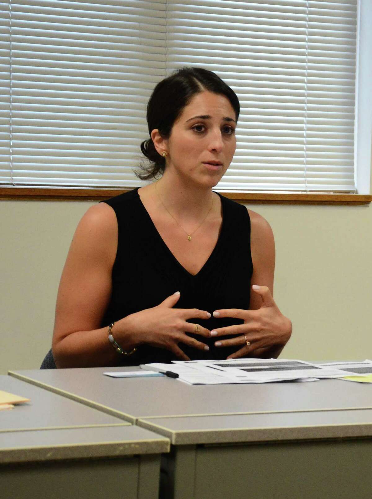Setta Mushegian, of the Stamford-based Center for Sexual Assault Crisis Counseling and Education, talks about ways college students should arm themselves against sexual violence on campus. Mushegian and other local sexual assault and domestic violence experts met to discuss such topics with town leaders Monday, July 21, 2014, at the New Canaan Police Department, in New Canaan, Conn.