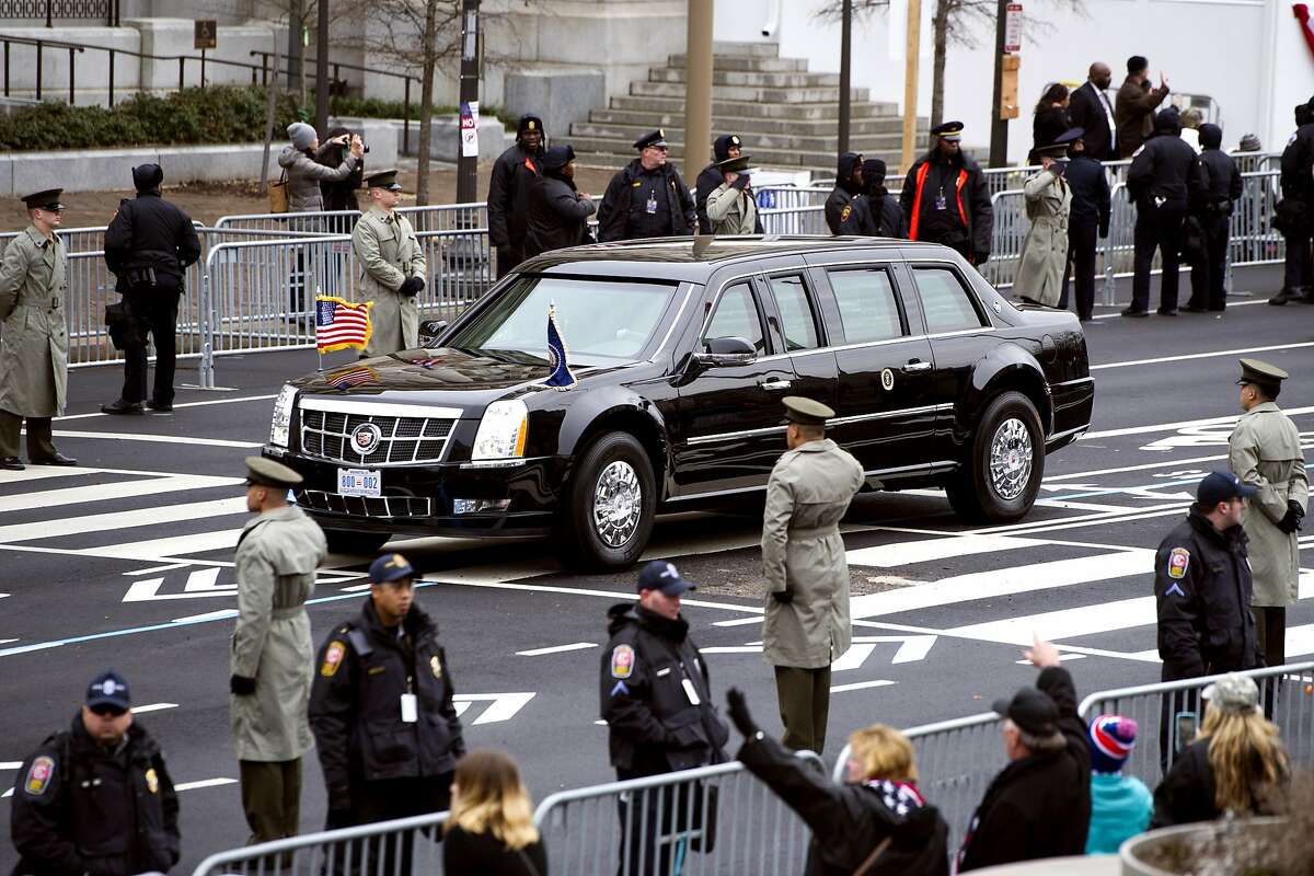 The Presidential motorcade drives on Pennsylvania Avenue to the Capitol for the Inauguration of President-elect Donald Trump, Friday, Jan. 20, 2017 in Washington. (AP Photo/Cliff Owen)