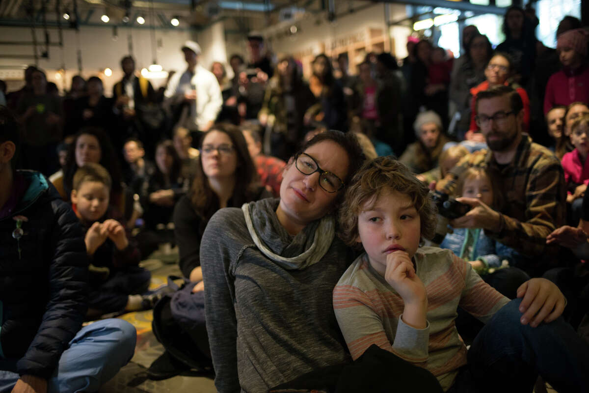 The crowd listens to local music during KEXP's bed in for peace, inspired by Yoko Ono and John Lennon's 1969 bed in, on the day of the inauguration of President Donald Trump, Friday, Jan. 20, 2017.