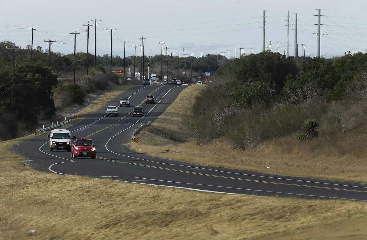 Traffic along Texas 211 is relatively light during the 5 p.m. rush hour compared to areas of the North Side.