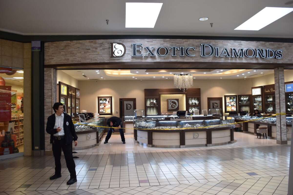 Surveillance photos show jewelry store armed robbery suspects at South