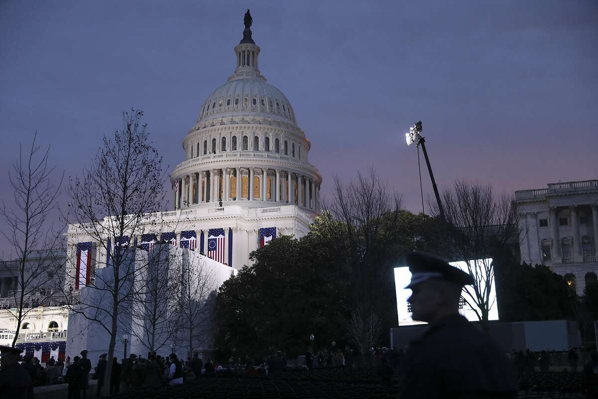 The U.S. Capitol lit in the morning ahead of the inauguration ceremony for President Donald Trump in Washington, Jan. 20, 2017. (Damon Winter/The New York Times)