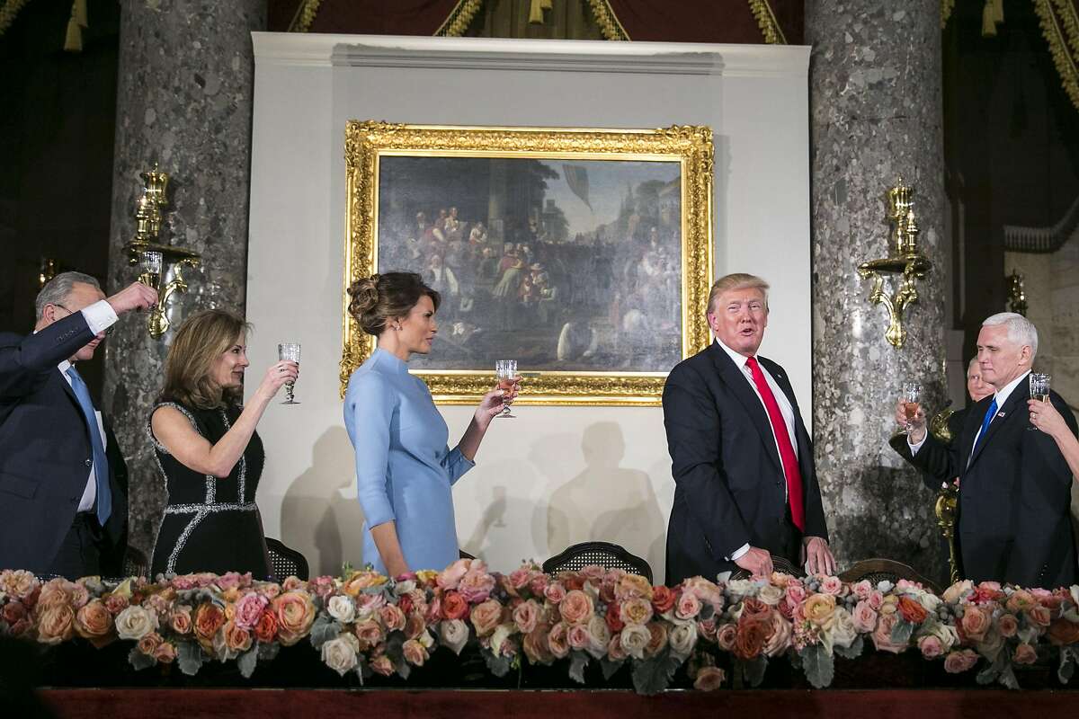 President Donald Trump is toasted at the Inaugural Luncheon in Statuary Hall at the U.S. Capitol in Washington, Jan. 20, 2017. From left: Senate Minority Leader Chuck Schumer (D-N.Y.), Abigail Perlman Blunt, first lady Melania Trump, President Trump and Vice President Mike Pence. (Al Drago/The New York Times)
