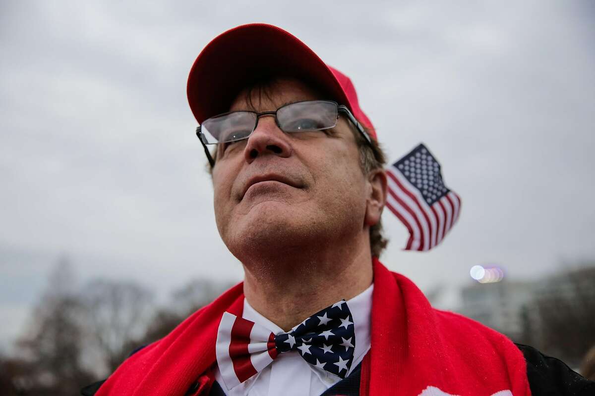 Trump supporter West Walker of Stockton, California looks at the stage during Donald Trump's Presidential inauguration in Washington, D.C., on Friday, Jan. 20, 2017.