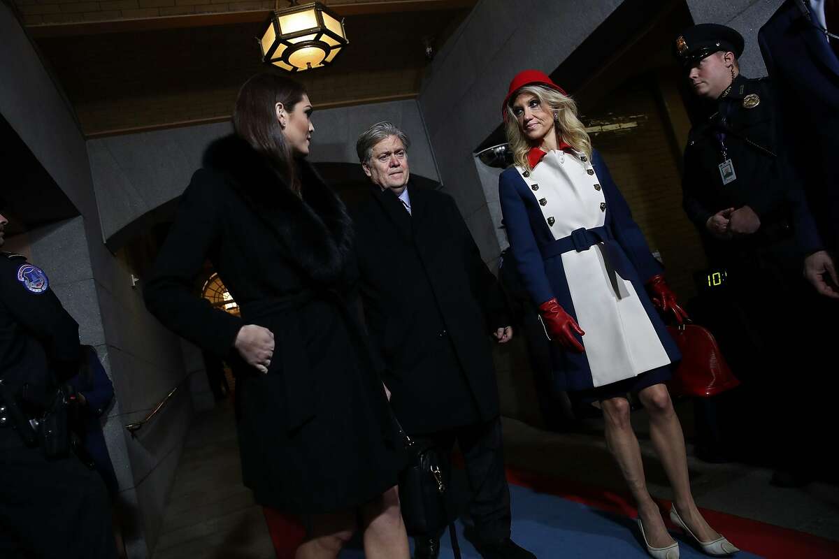 (L-R) Dona'd Trump's White House Director of Strategic Communications Hope Hicks, Senior Counselor Steve Bannon and Counselor to the President Kellyanne Conway arrive on the West Front of the US Capitol for Donald Trump's inauguration ceremony, in Washington, DC, on January 20, 2107.