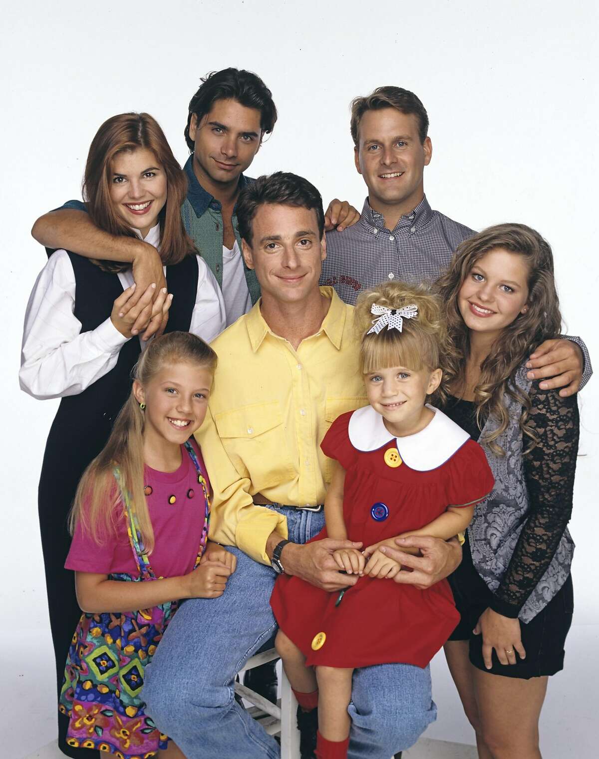 UNITED STATES - SEPTEMBER 14: FULL HOUSE - Season Seven - Gallery - 9/14/93, Pictured, back row: Lori Loughlin (Rebecca), John Stamos (Jesse), Dave Coulier (Joey); bottom row: Jodie Sweetin (Stephanie), Bob Saget (Danny), Mary Kate Olsen (Michelle), Candace Cameron (D.J.), (Photo by Bob D'Amico/ABC via Getty Images)