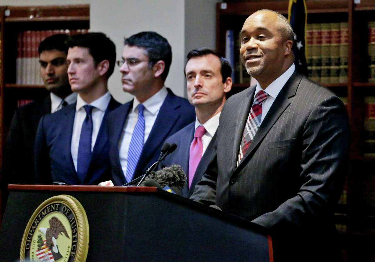 U.S. attorney Robert Capers, right, speaks during a news conference, announcing charges for Mexican drug kingpin Joaquin "El Chapo" Guzman as the murderous architect of a three-decade-long web of violence, corruption and drug trafficking, Friday Jan. 20, 2017, in the Brooklyn borough of New York. Extradited Thursday from Mexico, Guzman was due later Friday in a federal court in Brooklyn. Prosecutors have sought to bring him to a U.S. court for years while he made brazen prison escapes and spent years on the run in Mexico. (AP Photo/Mark Lennihan)