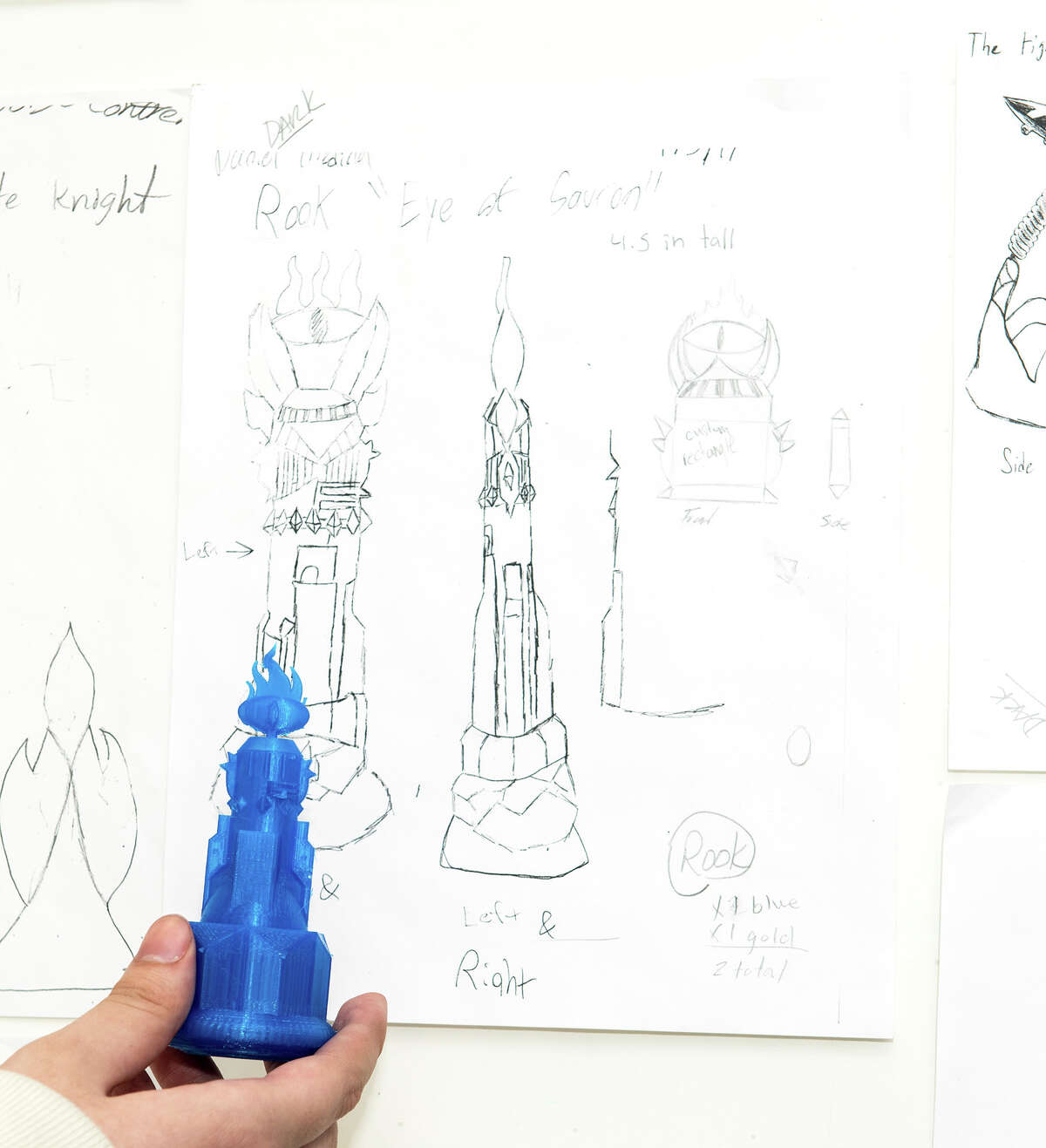 A student holds a unique 3-D printed chess piece next to the original art work on Friday, January 20, 2017 at the Alexander High School Library.