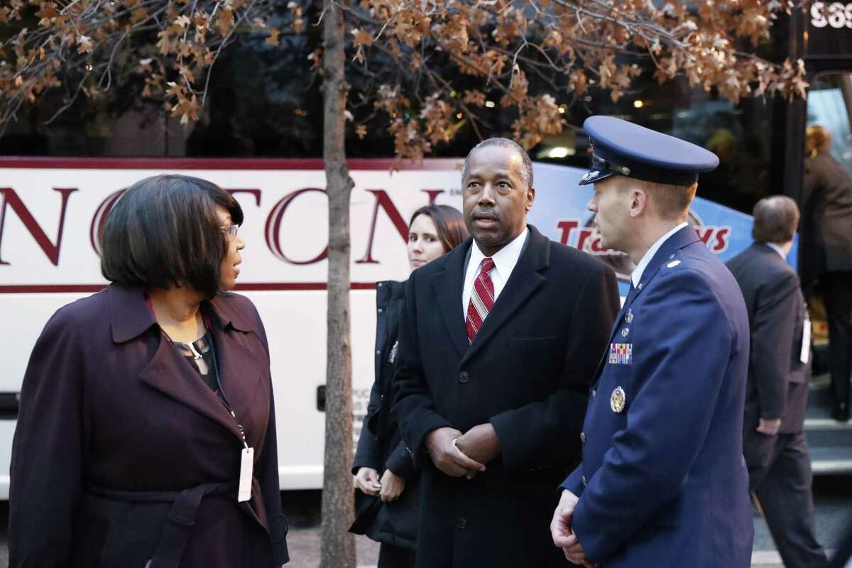 Housing and Urban Development Secretary-designate Dr. Ben Carson and his wife Candy, arrives for church service at St. JohnÂ?’s Episcopal Church across from the White House in Washington, Friday, Jan. 20, 2017, on Donald Trump's inauguration day. (AP Photo/Alex Brandon)