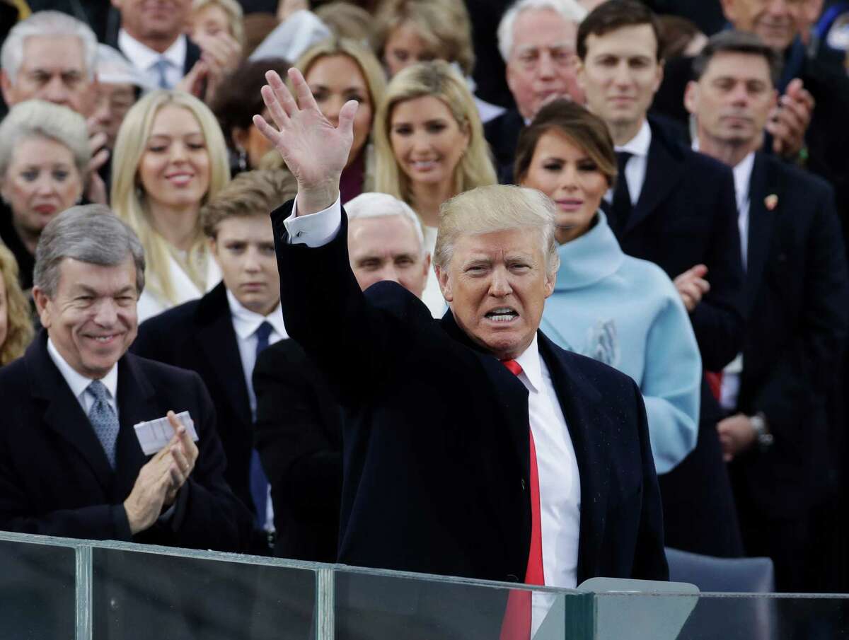 President Donald Trump waves after delivering his inaugural address after being sworn in as the 45th president of the United States during the 58th Presidential Inauguration at the U.S. Capitol in Washington, Friday, Jan. 20, 2017.(AP Photo/Patrick Semansky)