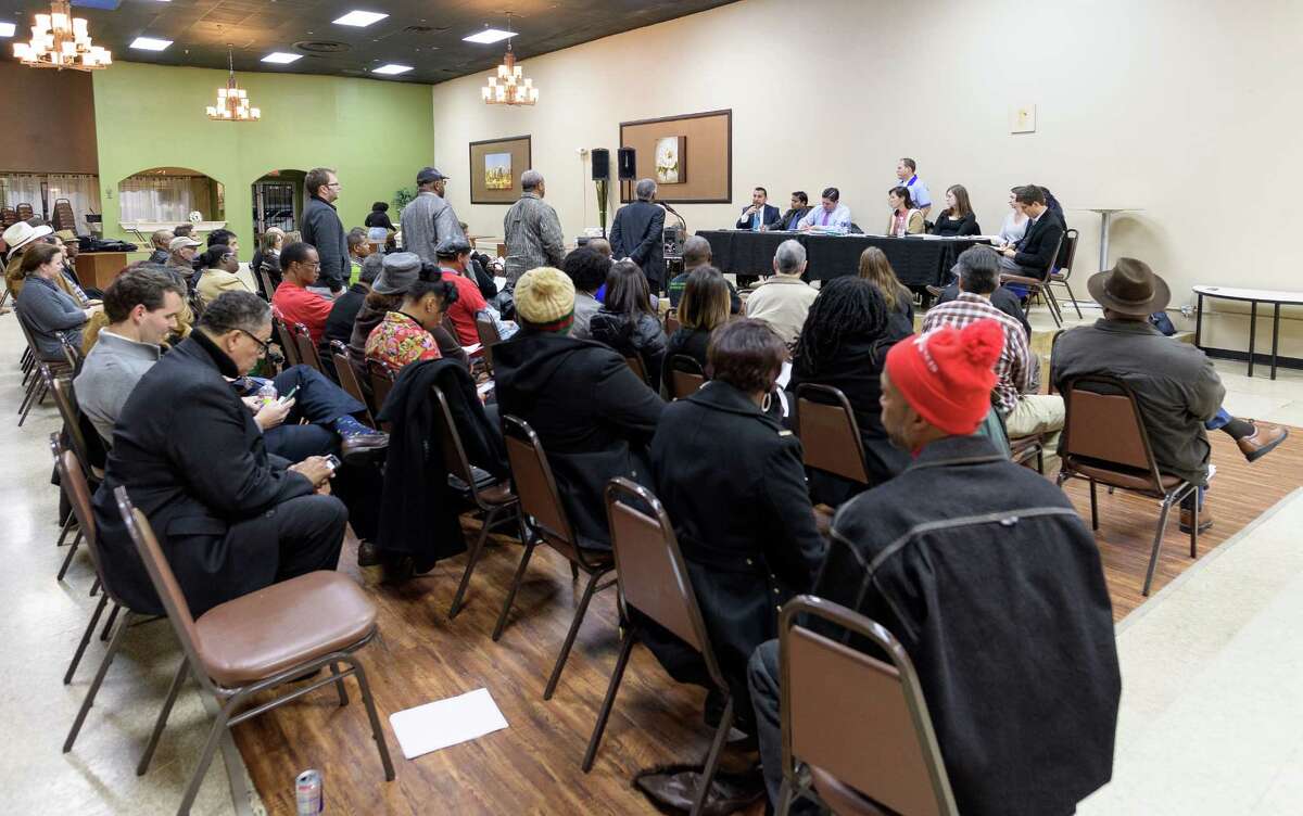 Fifth Ward residents line up to ask the panel questions during the Q&A session of the meeting over the proposed air permit for CemTech Concrete Ready Mix Inc. on Dec. 8, 2016, in Houston Texas.