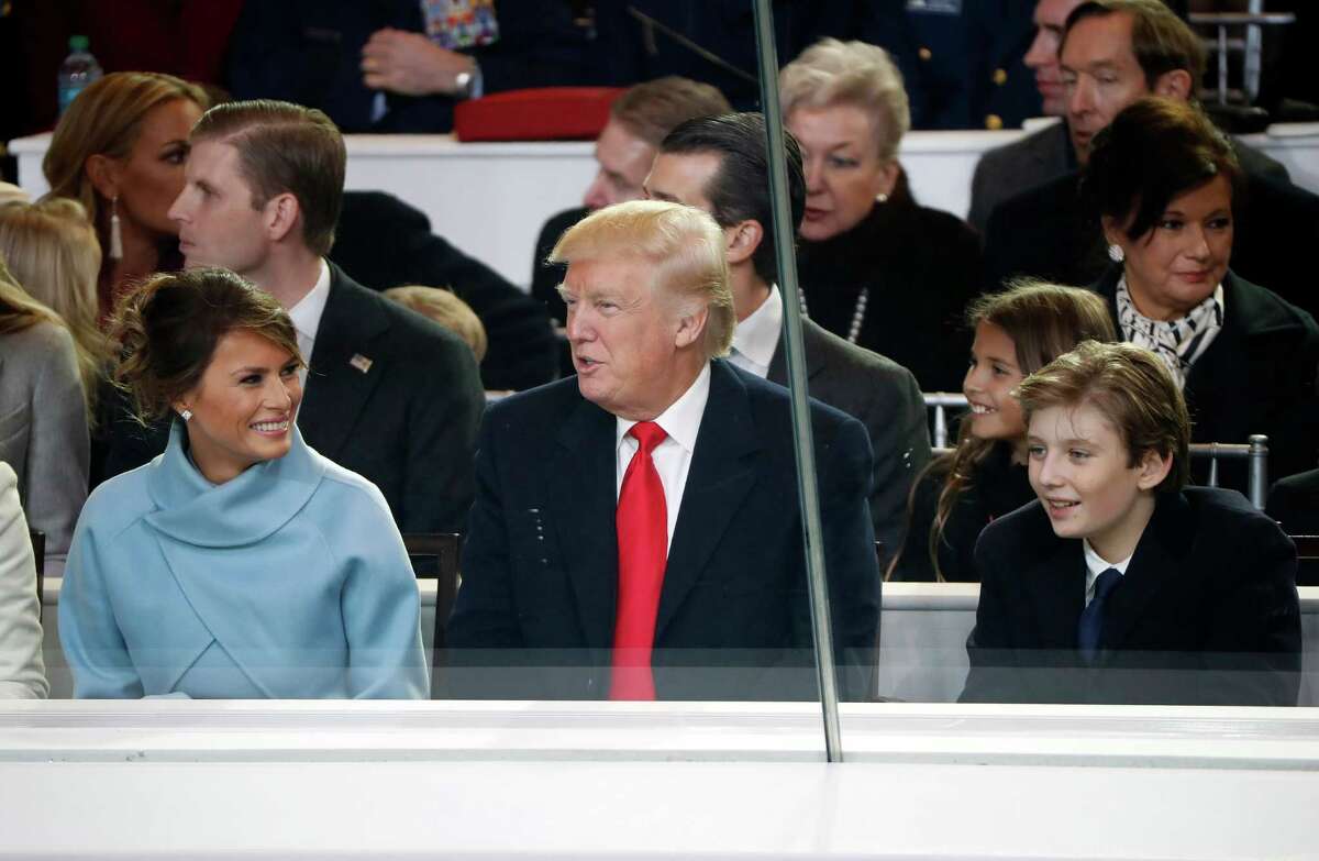 President Donald Trump watch with first lady Melania Trump and their son Barron during the 58th Presidential Inauguration parade for President Donald Trump in Washington. Friday, Jan. 20, 2017 (AP Photo/Pablo Martinez Monsivais)