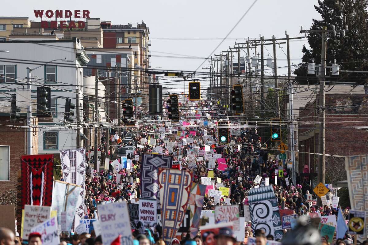 Women's March on Seattle participants move through the city's core on their way to Seattle Center on Saturday, Jan. 21, 2017.