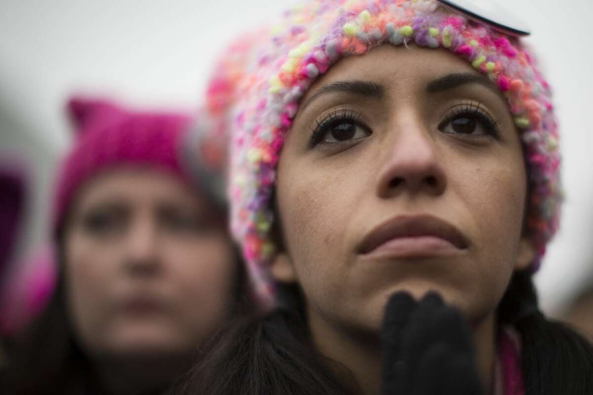 Mayra Black, 34, gets emotional as she listens to the speeches at the Women's March rally a day after the inauguration of President Donald Trump, Saturday, Jan. 21, 2017, in Washington D.C.. ( Marie D. De Jesus / Houston Chronicle )