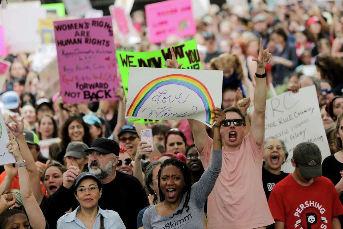 More than 20,000 people in Houston gathered Saturday at City Hall, joining tens of thousands of other Texans in protest. Story on page A3.