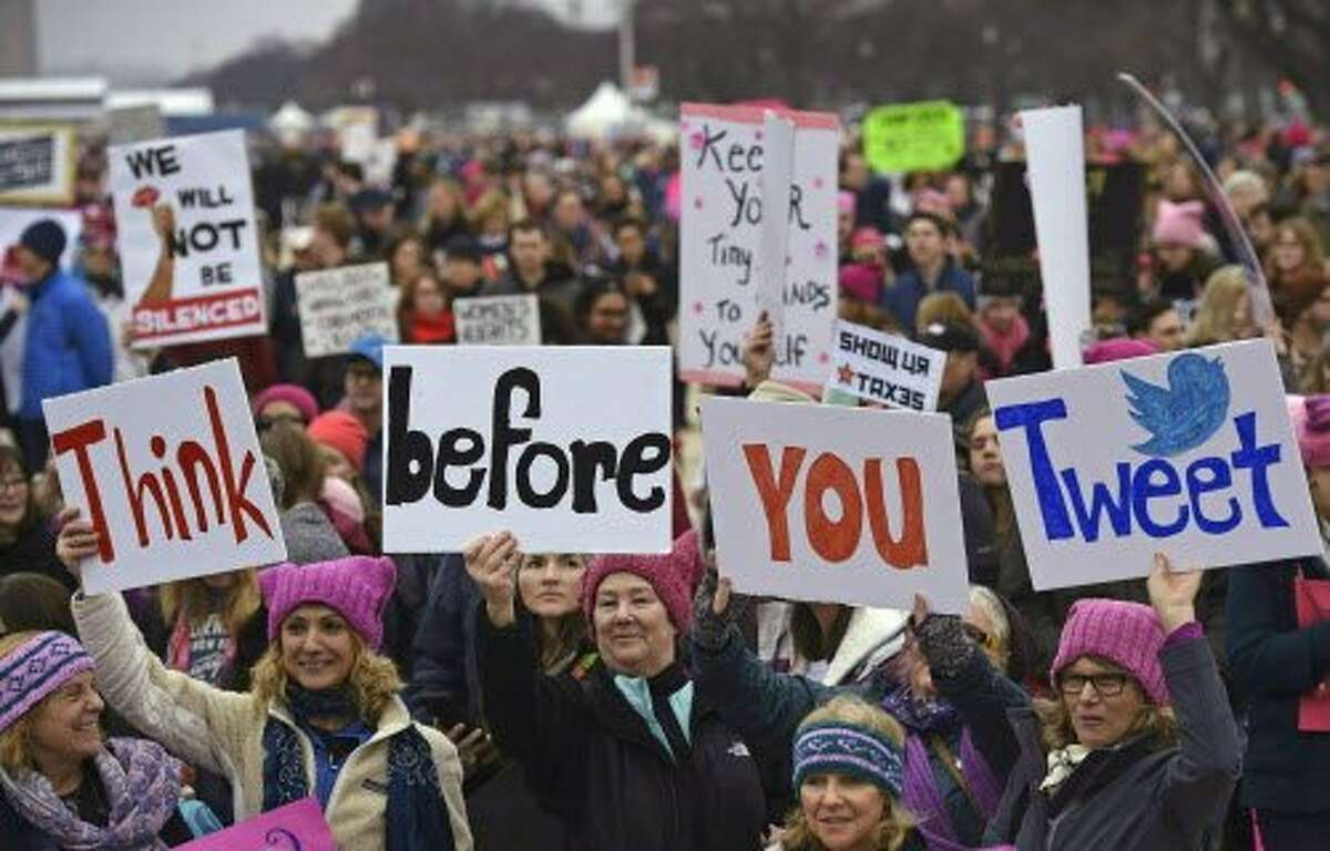 Demonstrators protest on the National Mall in Washington, DC, for the Women's March on January 21, 2017. Hundreds of thousands of protesters spearheaded by women's rights groups demonstrated across the US to send a defiant message to US President Donald Trump. / AFP PHOTO / Andrew CABALLERO-REYNOLDSANDREW CABALLERO-REYNOLDS/AFP/Getty Images