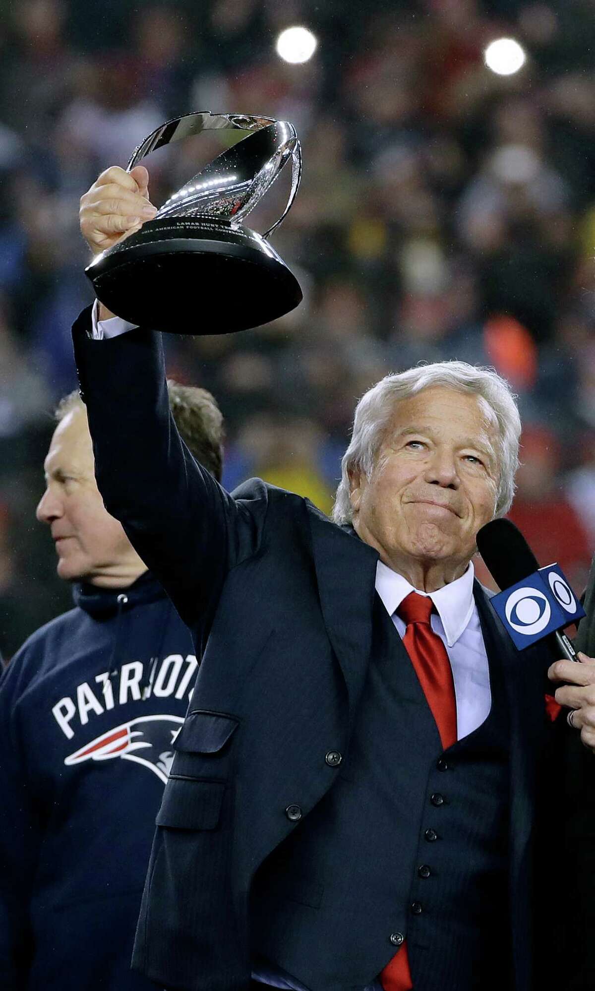 Jon Bon Jovi (L), New England Patriots Owner Robert Kraft, and