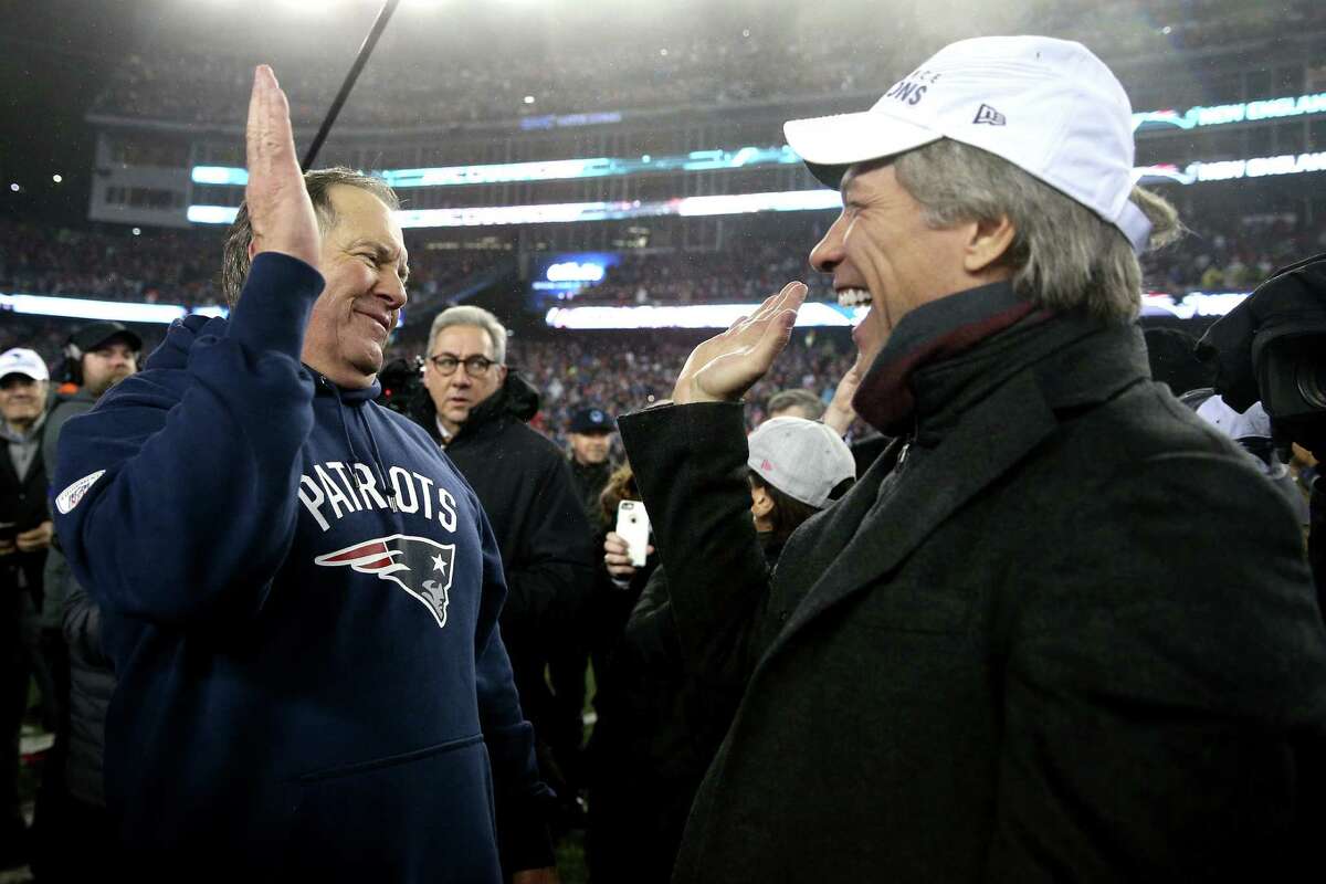 FOXBORO, MA - JANUARY 22: Head coach Bill Belichick of the New England Patriots (L) celebrates with Jon Bon Jovi after the Patriots defeated the Steelers 36-17 to win the AFC Championship Game at Gillette Stadium on January 22, 2017 in Foxboro, Massachusetts.