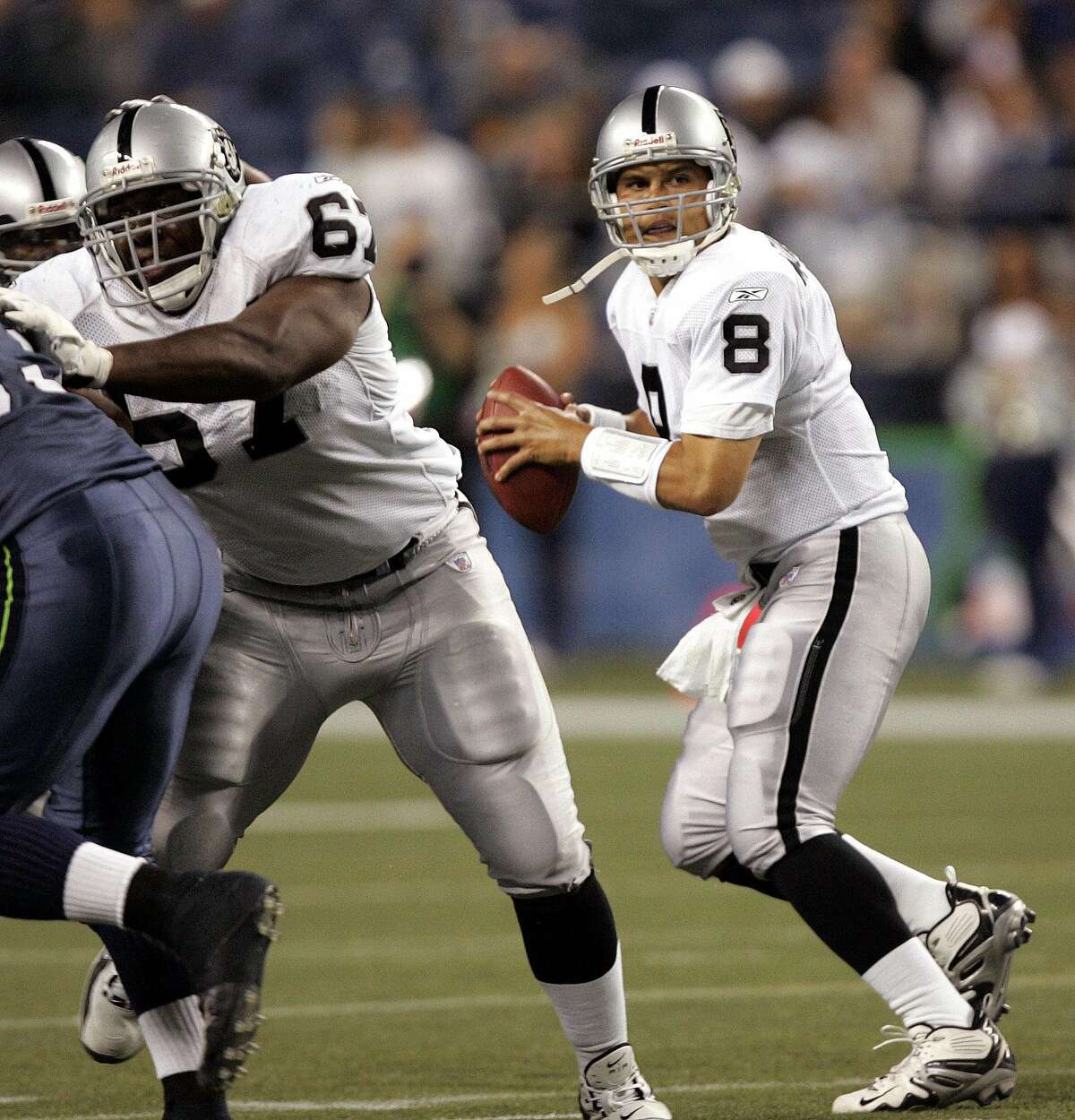 Oakland Raiders quarterback Marques Tuiasosopo drops back to pass against the Seattle Seahawks in the second half of an NFL exhibition football game in Seattle as Kevin Boothe blocks, Thursday, Aug. 31, 2006. The Seahawks won 30-7. (AP Photo/Elaine Thompson) Ran on: 09-22-2006 Rookie guard Kevin Boothe is a sixth-round pick out of Cornell. Ran on: 09-29-2006 Marques Tuiasosopo returns to his role as No. 2 QB with Aaron Brooks out with an injury. Ran on: 10-10-2006 Kevin Boothe is listed as questionable after sustaining a broken nose against the 49ers.