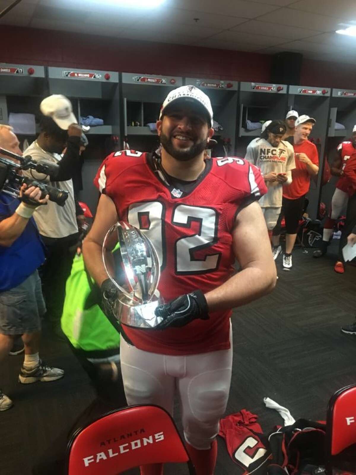 CBA graduate and Clifton Park native Joe Vellano poses with the NFC championshpi trophy Sunday, Jan. 22, 2017, after his Atlanta Falcons defeated the Green Bay Packers 44-21 to advance to Super Bowl LI in Houston. (Photo courtesy Paul Vellano)
