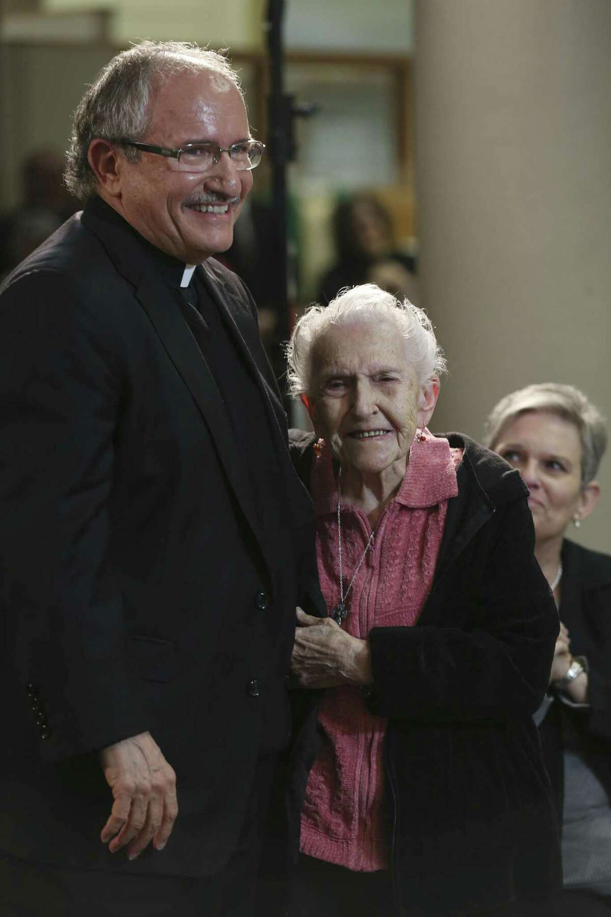Monsignor Michael Joseph Boulette hugs his mother, Pat Boulette, 96, after his appointment as auxiliary bishop of the Archdiocese of San Antonio was announced Monday. Boulette was born in New York state, but grew up in Fredericksburg and attended high school in San Antonio.