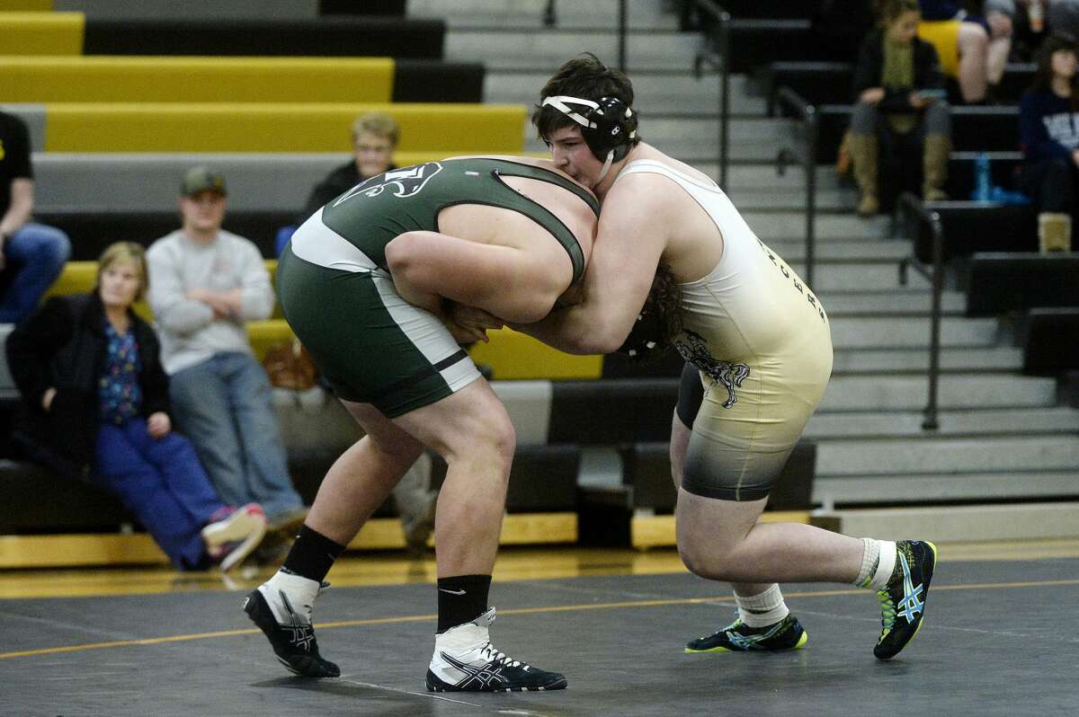 Bullock Creek's Jackson Lambert, right, and Freeland's Chase Crook wrestle in their 285-pound match during a wrestling tri-meet on Monday at Bullock Creek High School. Crook won the match.