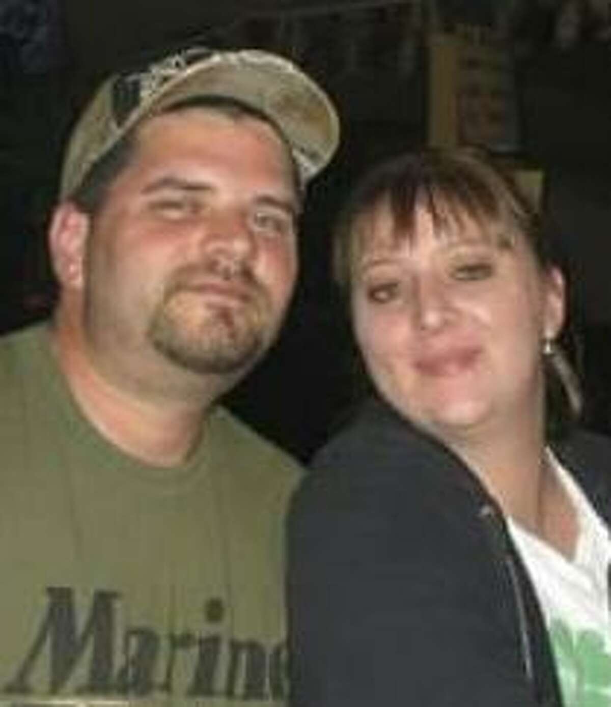 Jonathan Murphy, shown with his wife, Aimee, was a bystander killed during Sunday’s botched robbery at the Rolling Oaks Mall. “He was my rock. … And now he’s gone,” Aimee Murphy said.
