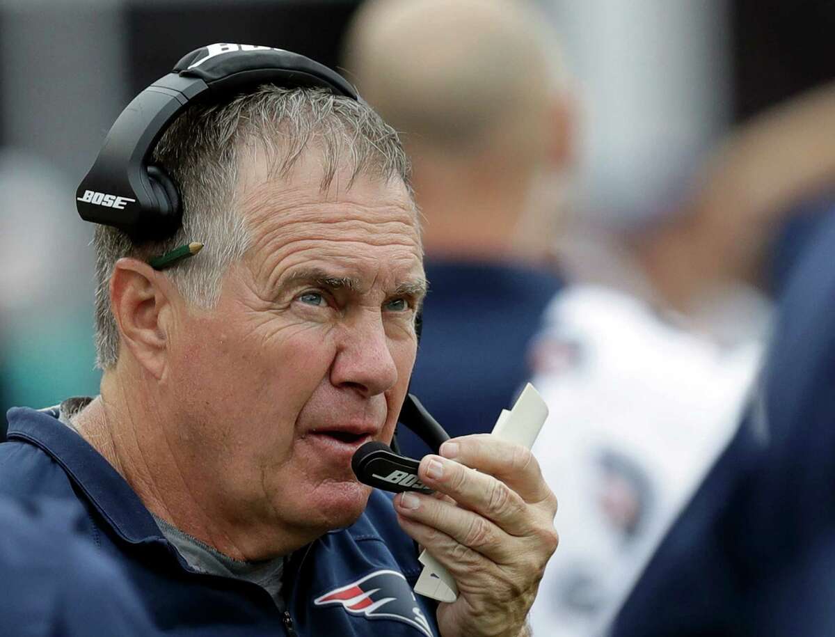FILE - In this Sept. 18, 2016, file photo, New England Patriots head coach Bill Belichick watches from the sideline during the first half of an NFL football game against the Miami Dolphins, in Foxborough, Mass. The Patriots will battle the Atlanta Falcons in the Super Bowl on Feb. 5, 2017, in Houston. (AP Photo/Charles Krupa, File)
