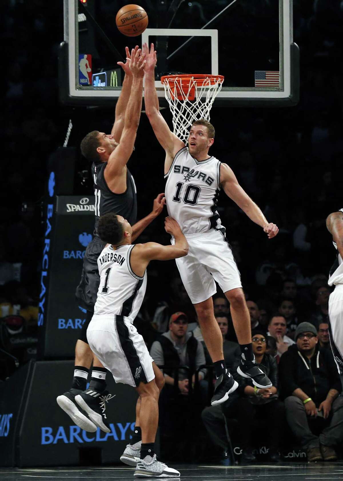 David Lee knocks the ball away from Brook Lopez during the second half at Barclays Center. Lee had 15 points and seven rebounds off the bench, a unit that had four score in double figures.